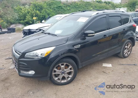 2014 Ford Escape Titanium из США, поврежденный, VIN 1FMCU9J90EUB63553